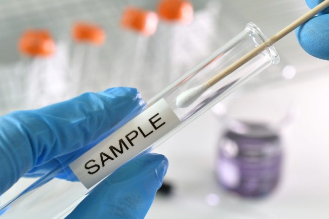 testing-swab-being-inserted-test-tube-labeled-sample-positive-negative-results-lab-laboratory-flu_t20_VWxprl